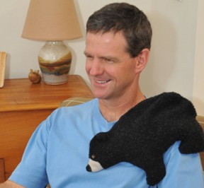 Black Bear microwave heating pad relaxes stiff back and shoulder muscles