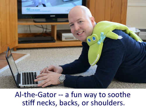Man using Al-the-Gator microwave heating pad to soothe a sore neck, back, and shoulder