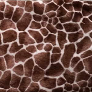 Giraffe pattern in plush fabric