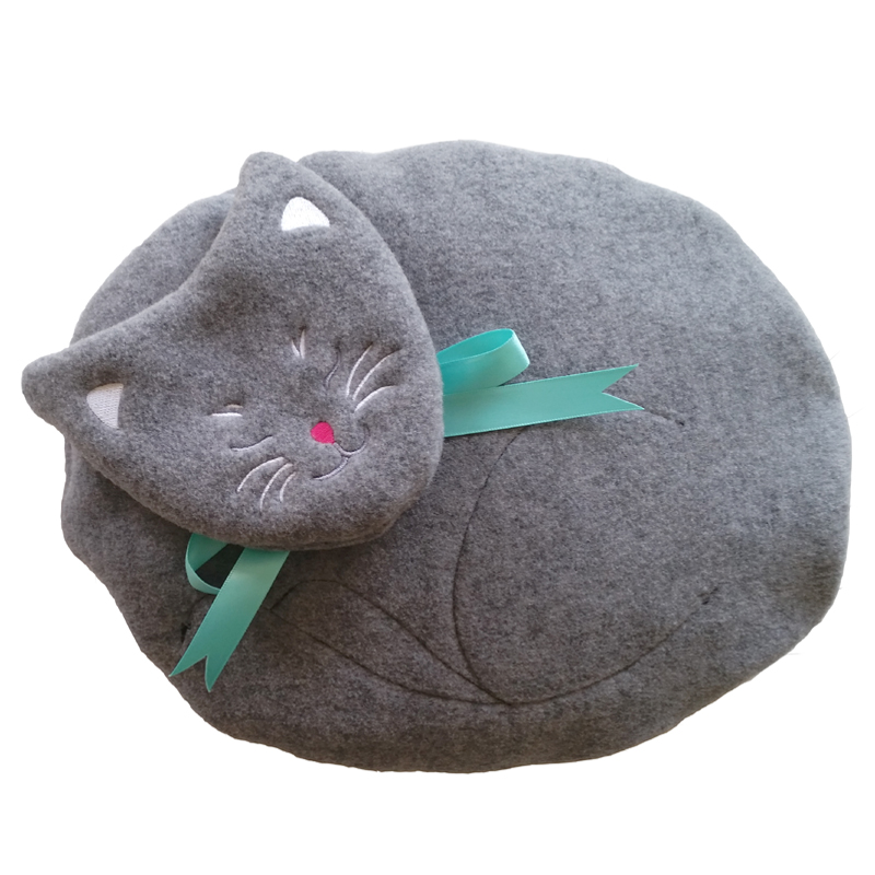 Gray Cat microwaveable bed warmer with an embroidered face and turquoise ribbon