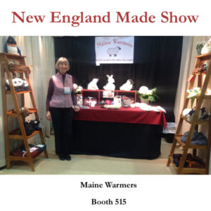 Betsy Hanscom in the Maine Warmers booth at the New England Made Show in Portland, Maine