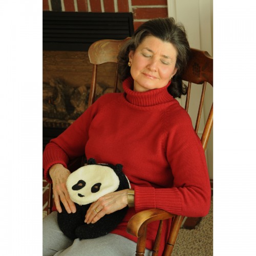 Woman relaxing with Panda Bear Warmer