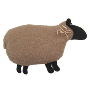 tan and black sheep warmer