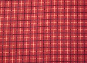 Flannel fabric in orange, yellow, and blue plaid for extra large back warmer