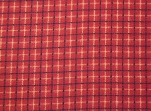 Flannel fabric in orange, yellow, and blue plaid for extra large back warmer