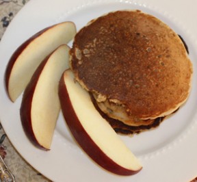 Gluten free oat pancakes with apple slices