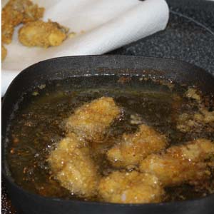 gluten free fired oysters in fry pan