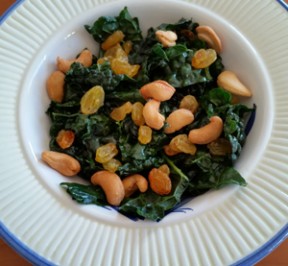 Kale Salad with golden raisins and cahsews