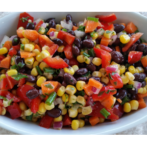 Photo of Corn and Black Bean Salad in a white ceramic bowl