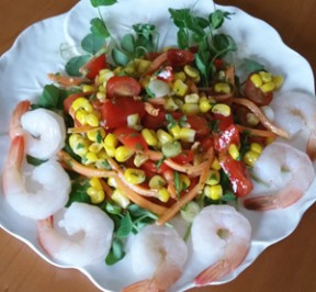 Cajun Corn Salad with Shrimp -- Gluten-free on a bed of fresh green pea shoots