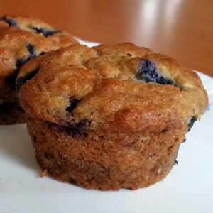 Banana Blueberry Muffins on a white plate