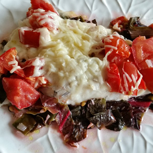 Baked Haddock Florentine on a white plate