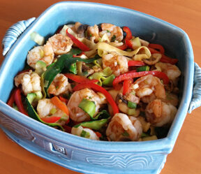 Shrimp and Zucchini Noodle Stir-fry in a casserole dish